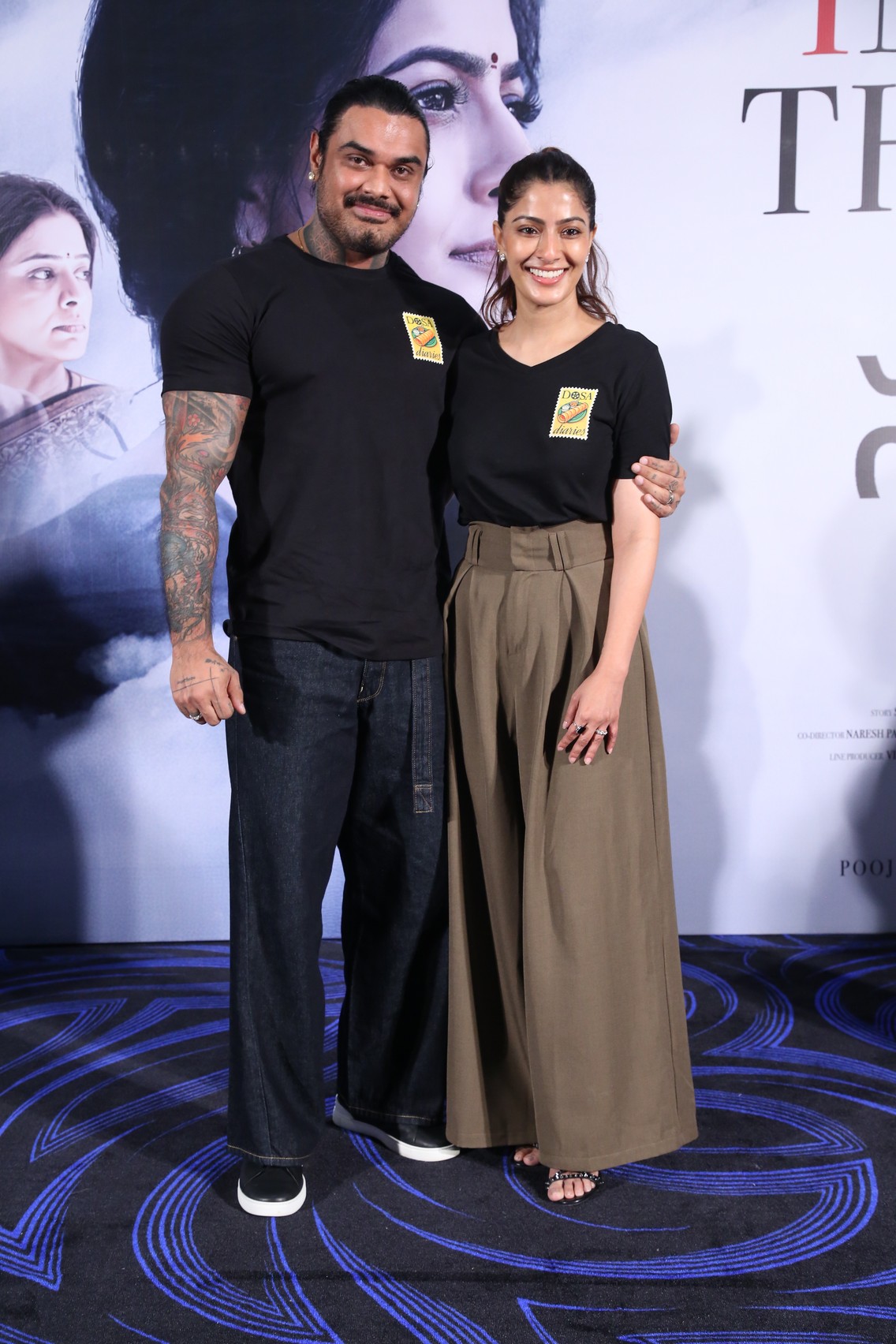 Nicholai Sachdev Varalaxmi Sarathkumar posing for media