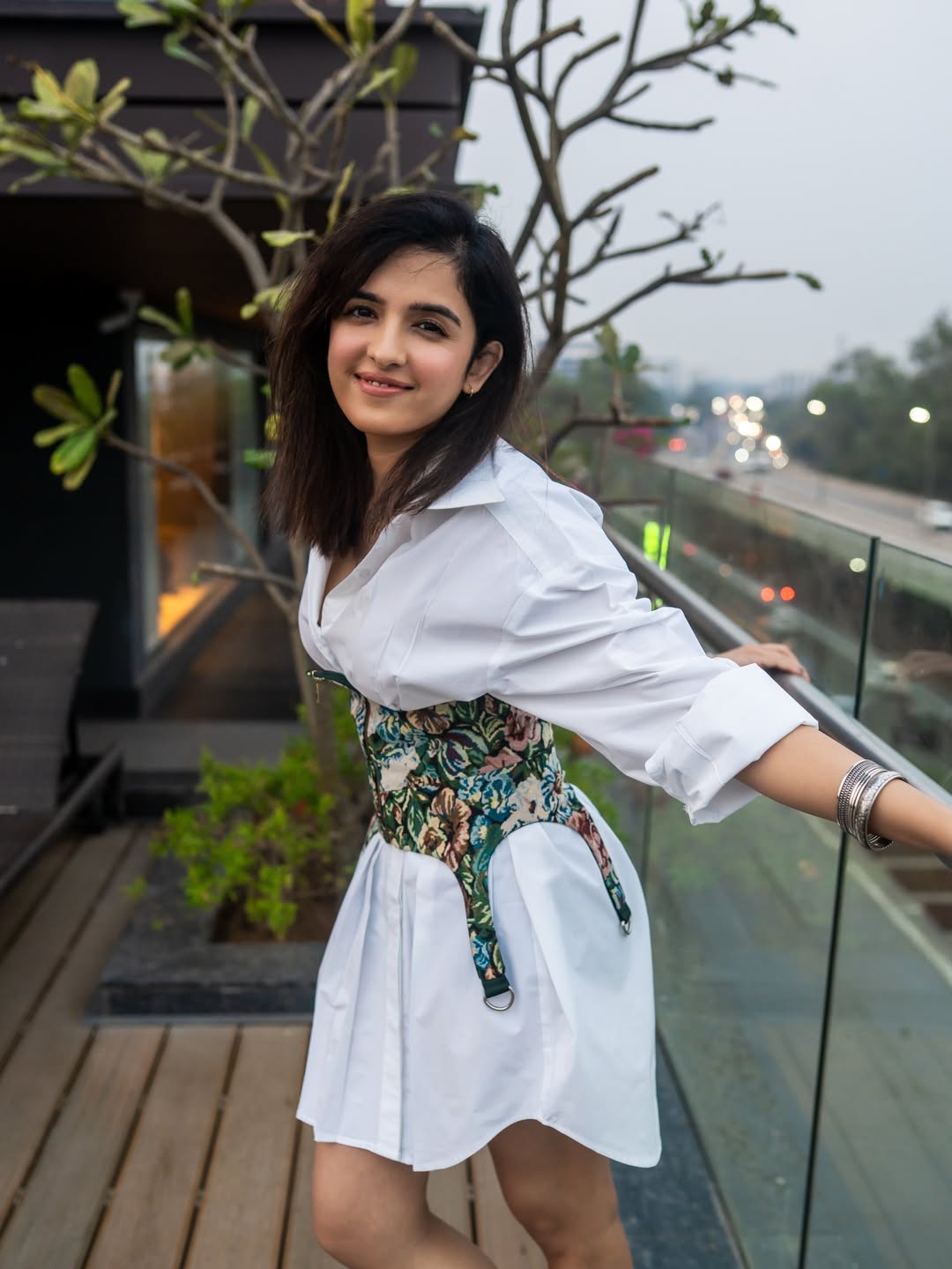 Shirley Setia elegant white dress balcony chic look