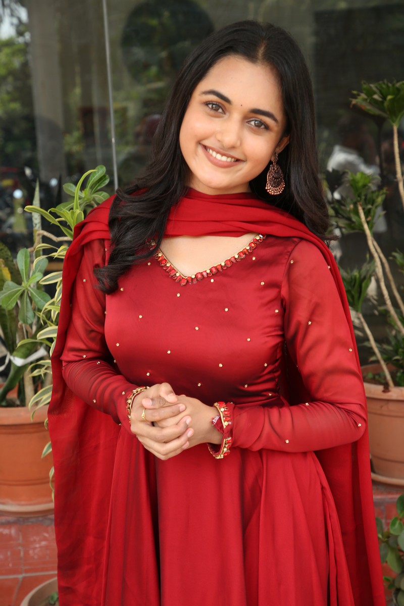 Smeha Manimegalai elegant red outfit fashionable confident look