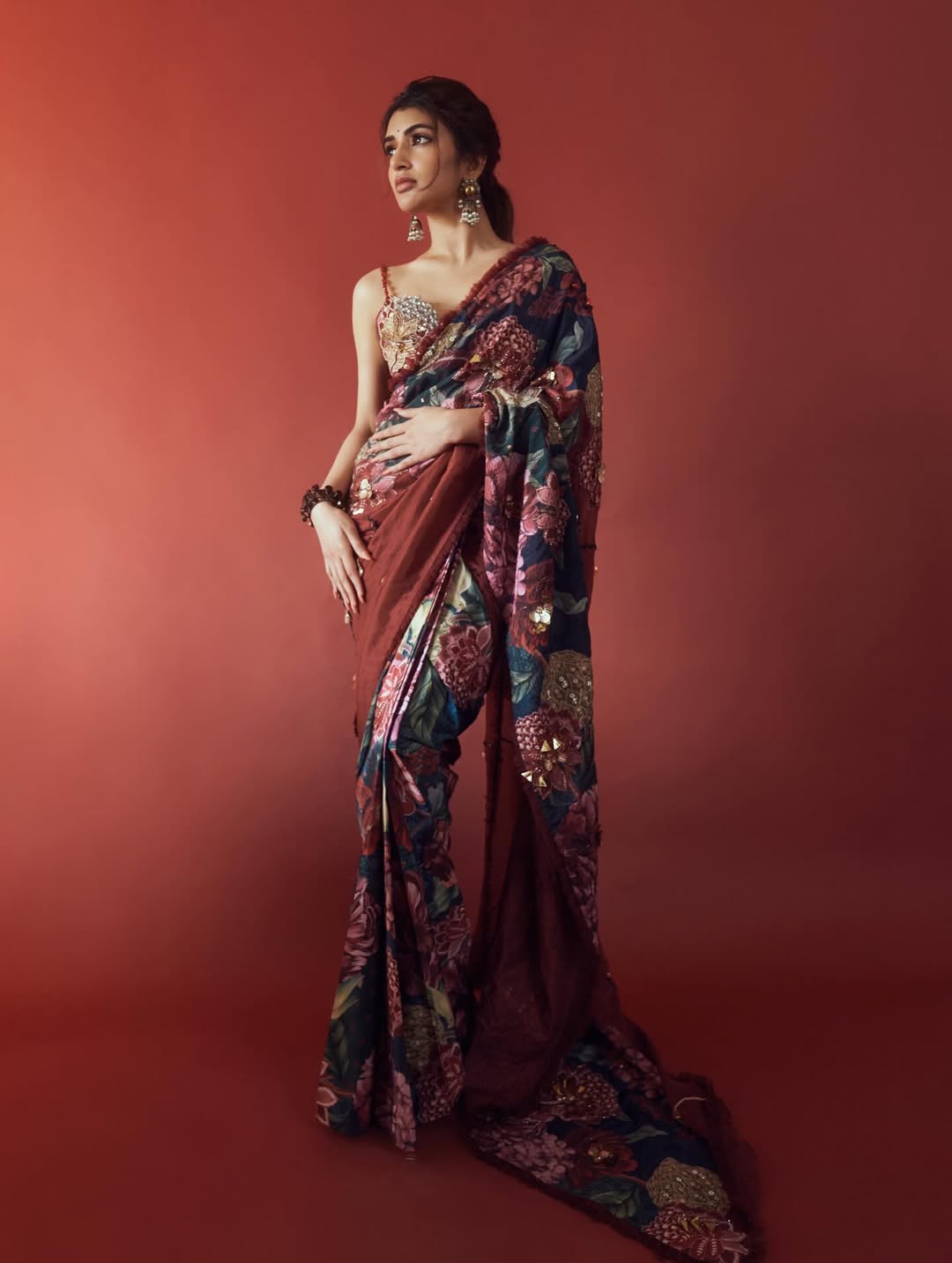 Sreeleela graceful saree look with subtle sparkling style