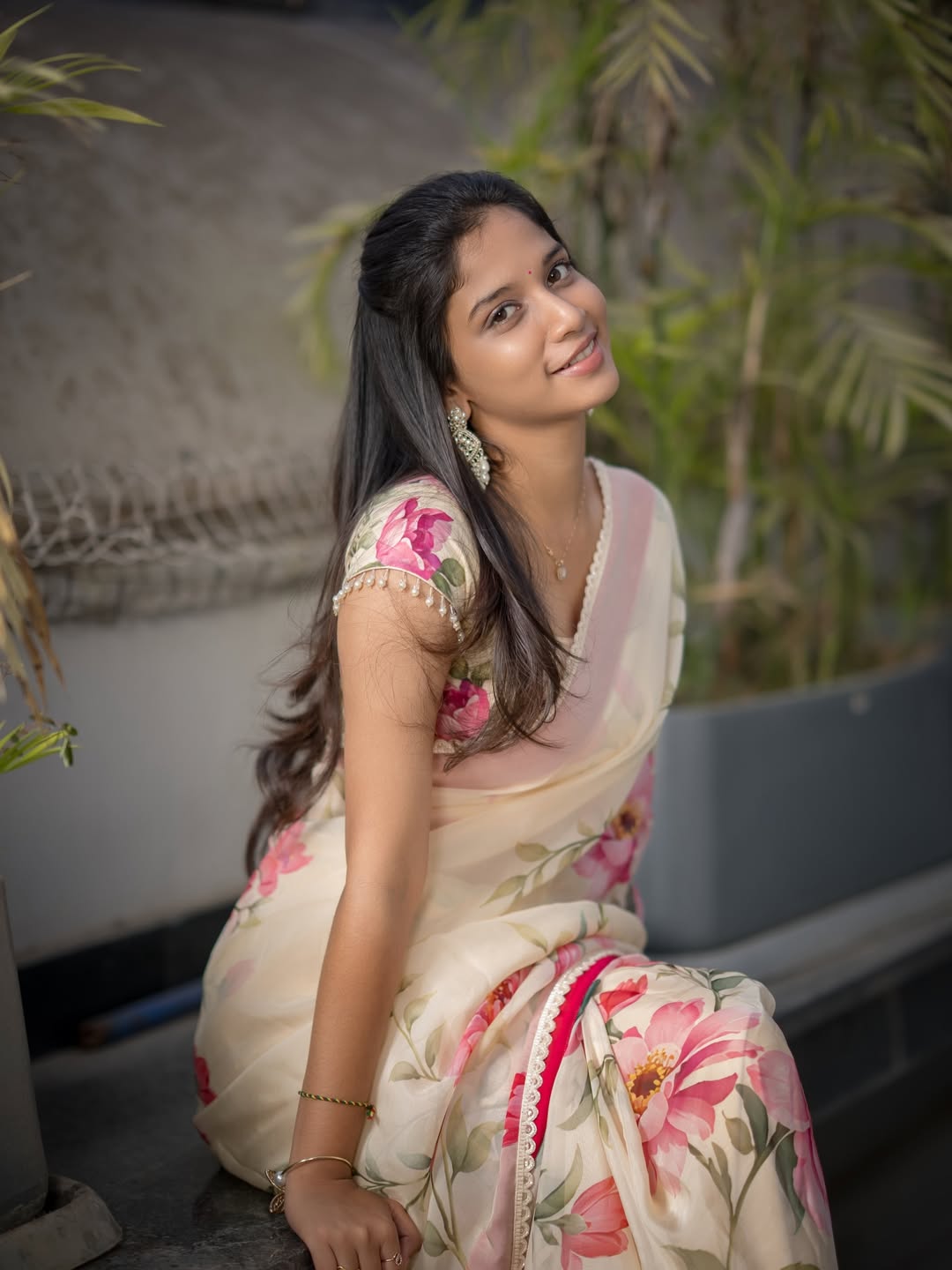 Sridevi Apalla floral saree elegant playful charm look