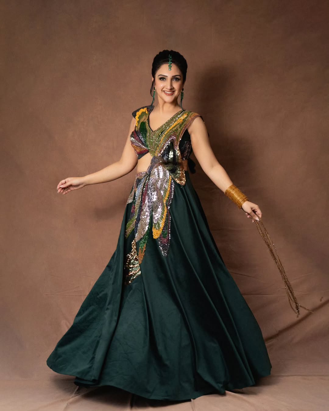 Sridevi Vijaykumar glamorous sequined dress confident pose