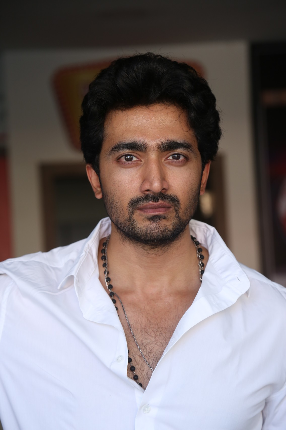 Srinath Maganti confident look in white shirt