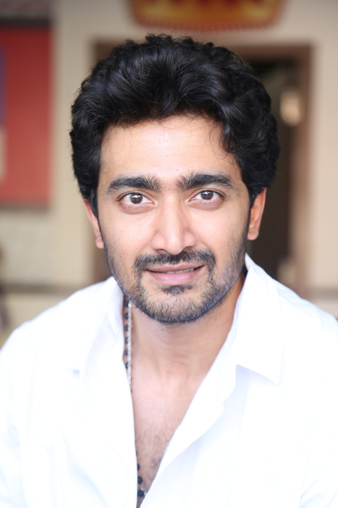 Srinath Maganti stylish pose wearing white shirt