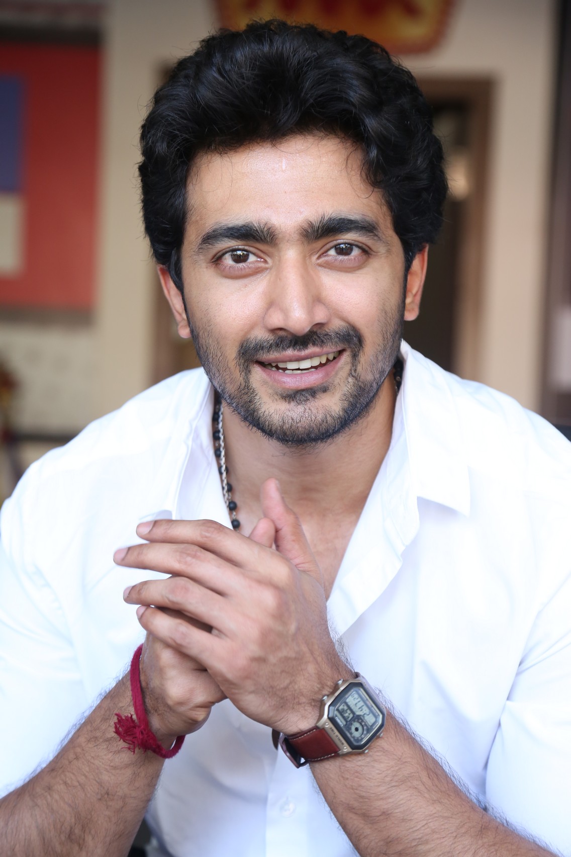 Srinath Maganti confident smile in white shirt