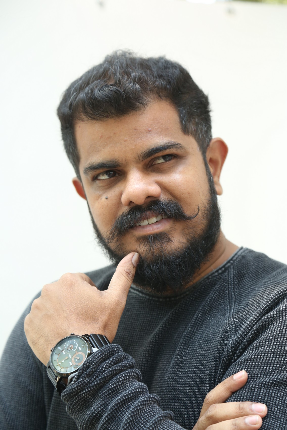 Sudhan rugged charm with confident pose