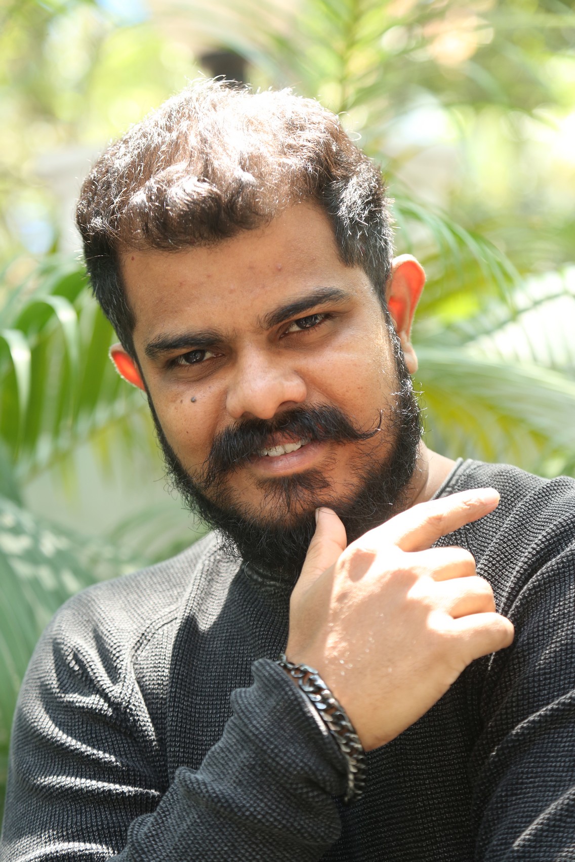 Sudhan stylish beard with playful confidence