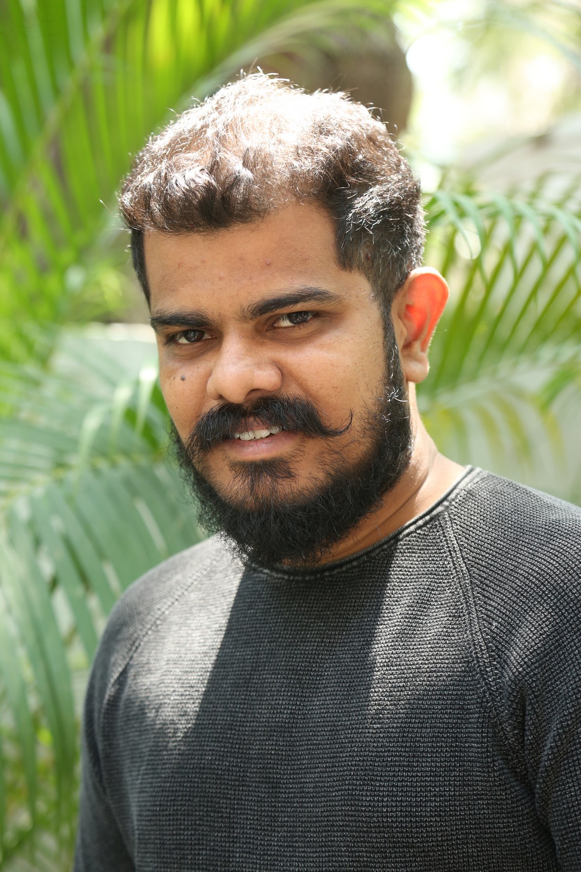 Sudhan well-groomed beard sharp appearance