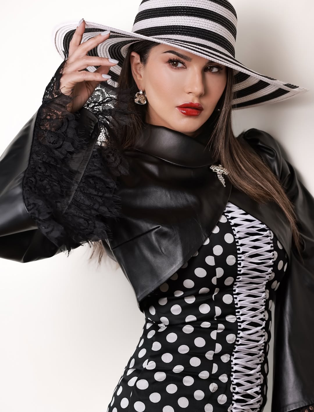 Sunny Leone polka dot outfit with bold stylish look