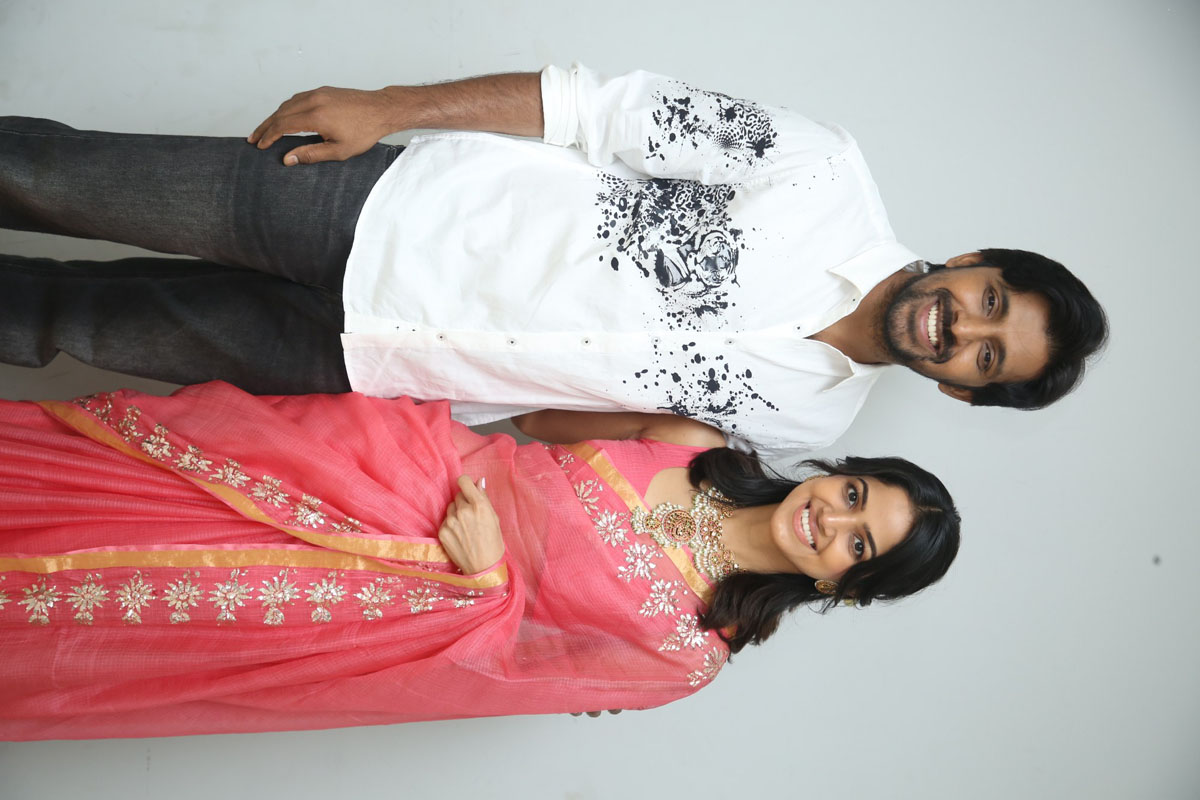 Priyadarshi Drishika Chandar duo pose at event