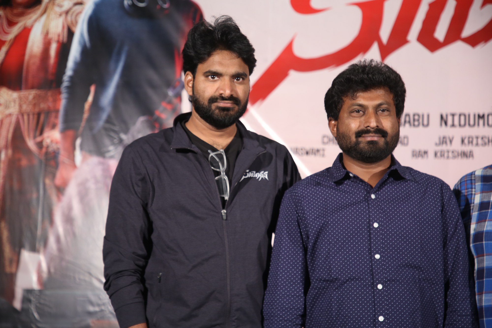 Team smiling at Suyodhana success meet