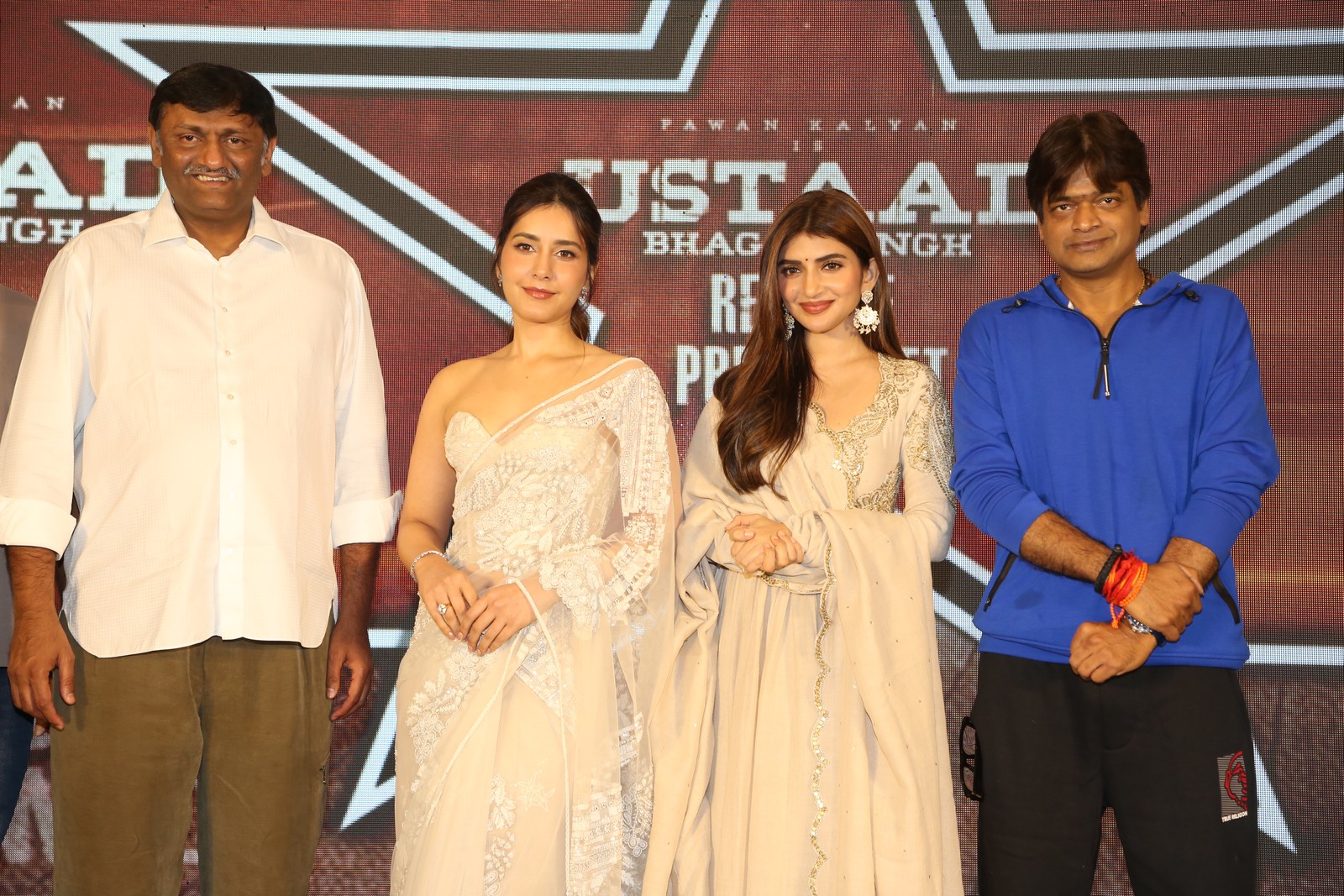 Naveen Yerneni Raashii Khanna Sreeleela Harish Shankar group pose