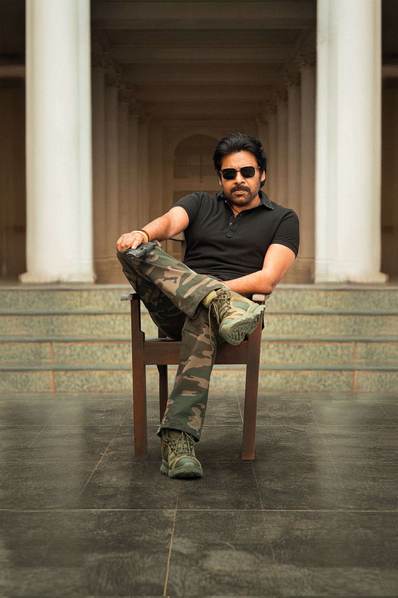 Pawan Kalyan intense seated look Ustaad Bhagat Singh still