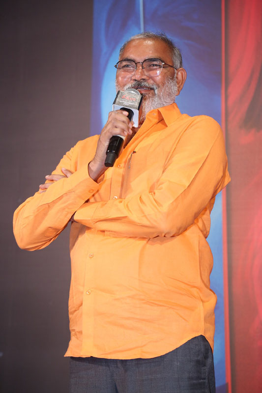 Producer Kishore Naidu speaking at Vadhala movie press meet
