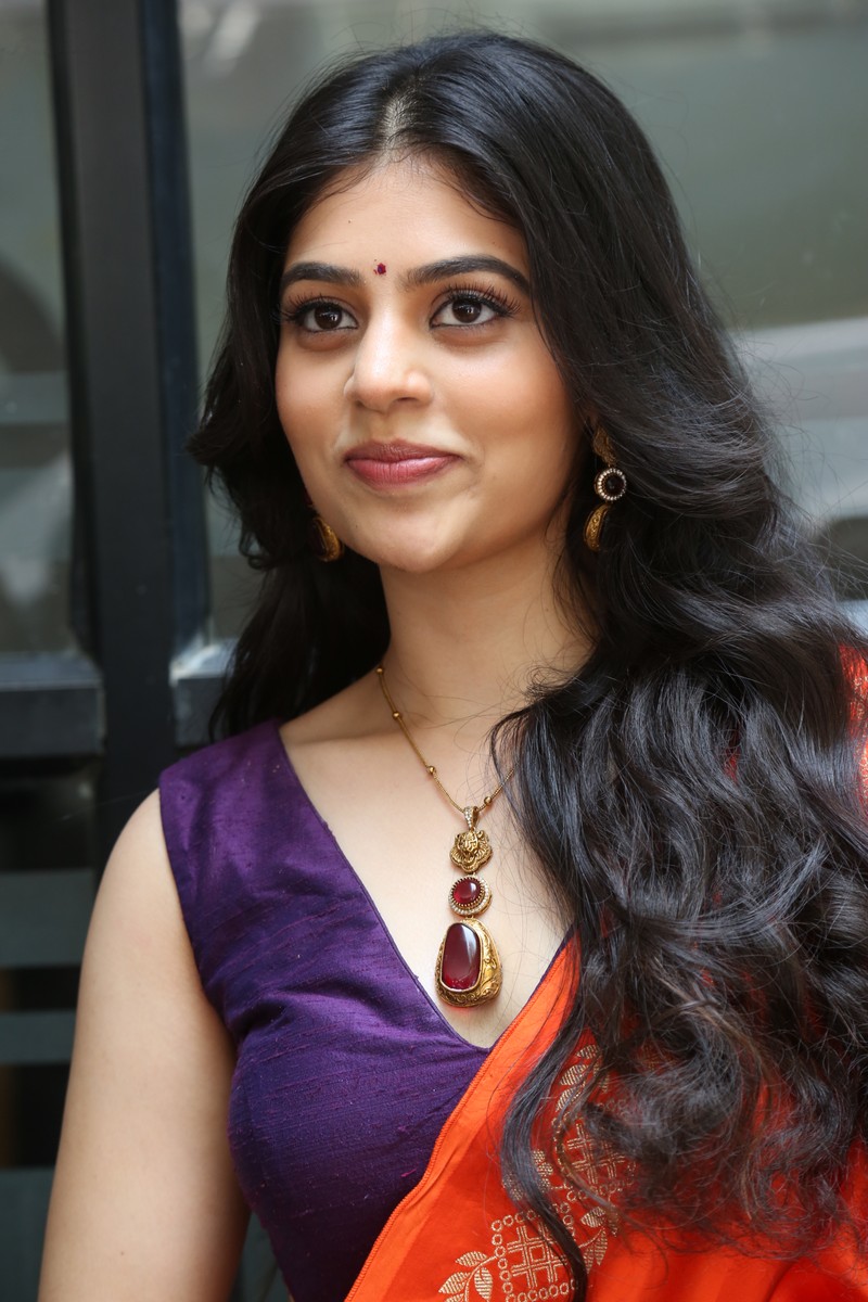 Bandhavi Sridhar purple orange outfit statement jewelry