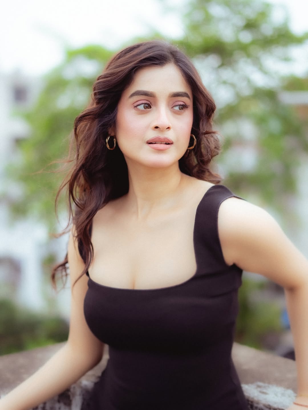 Darshana Banik wearing a simple black dress styled with effortless elegance