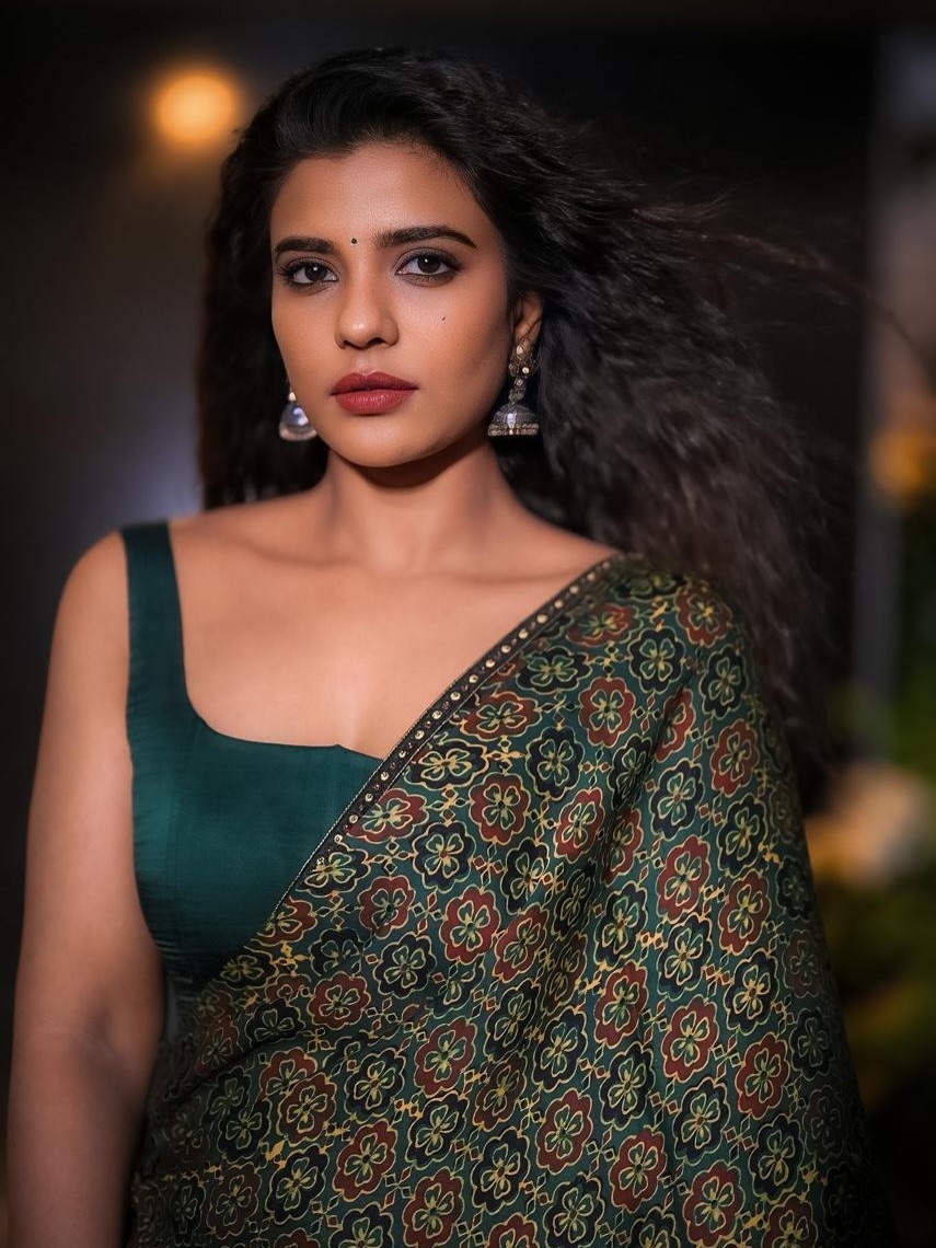 Aishwarya Rajesh in a saree with statement earrings and vintage-inspired styling