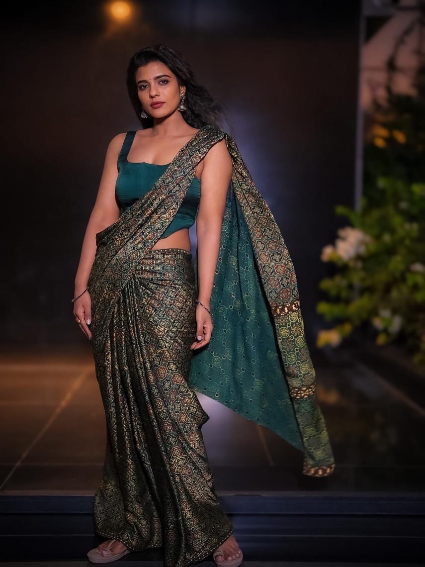 Aishwarya Rajesh in a saree with confident pose and modern elegant styling