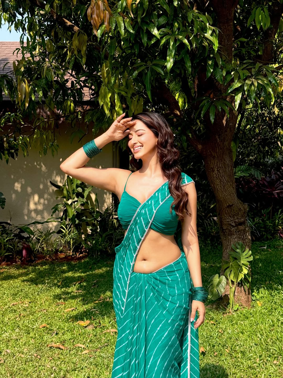 Eshanya Maheshwari teal saree elegant confident pose