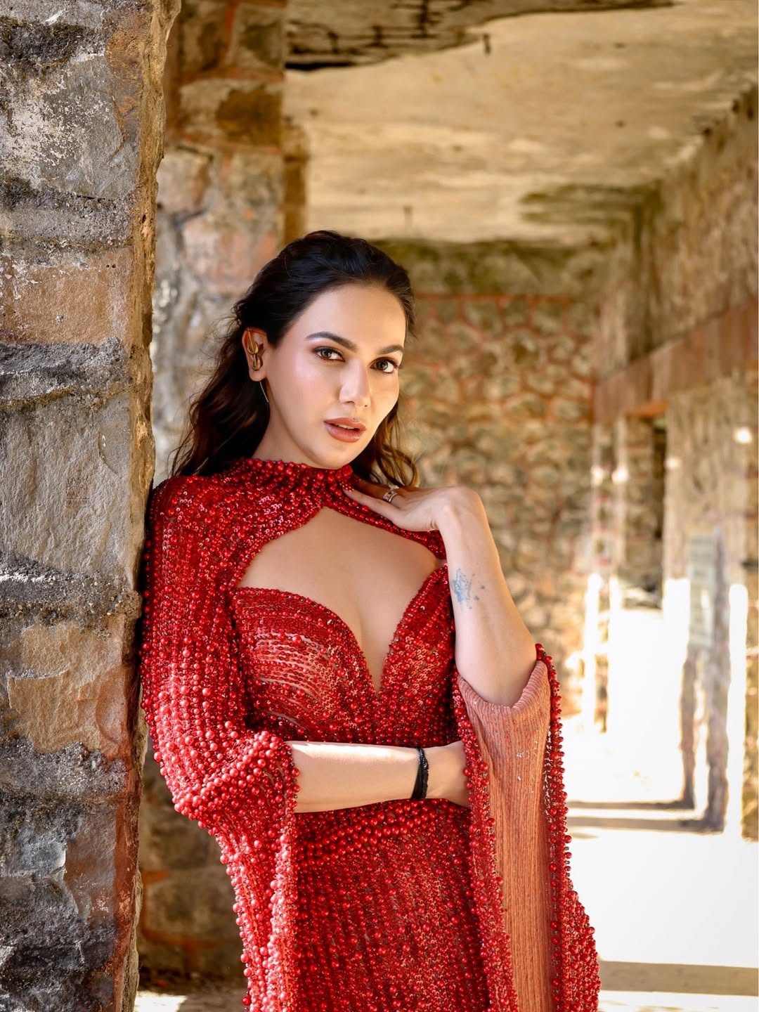 Palak Purswani in stunning red attire with graceful style