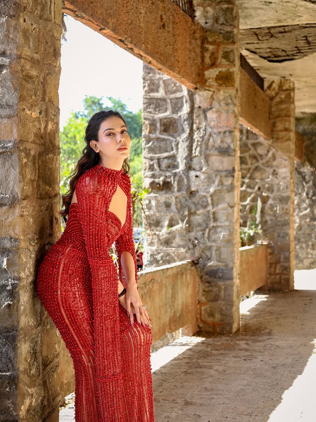Palak Purswani in red beaded gown bold fashion statement