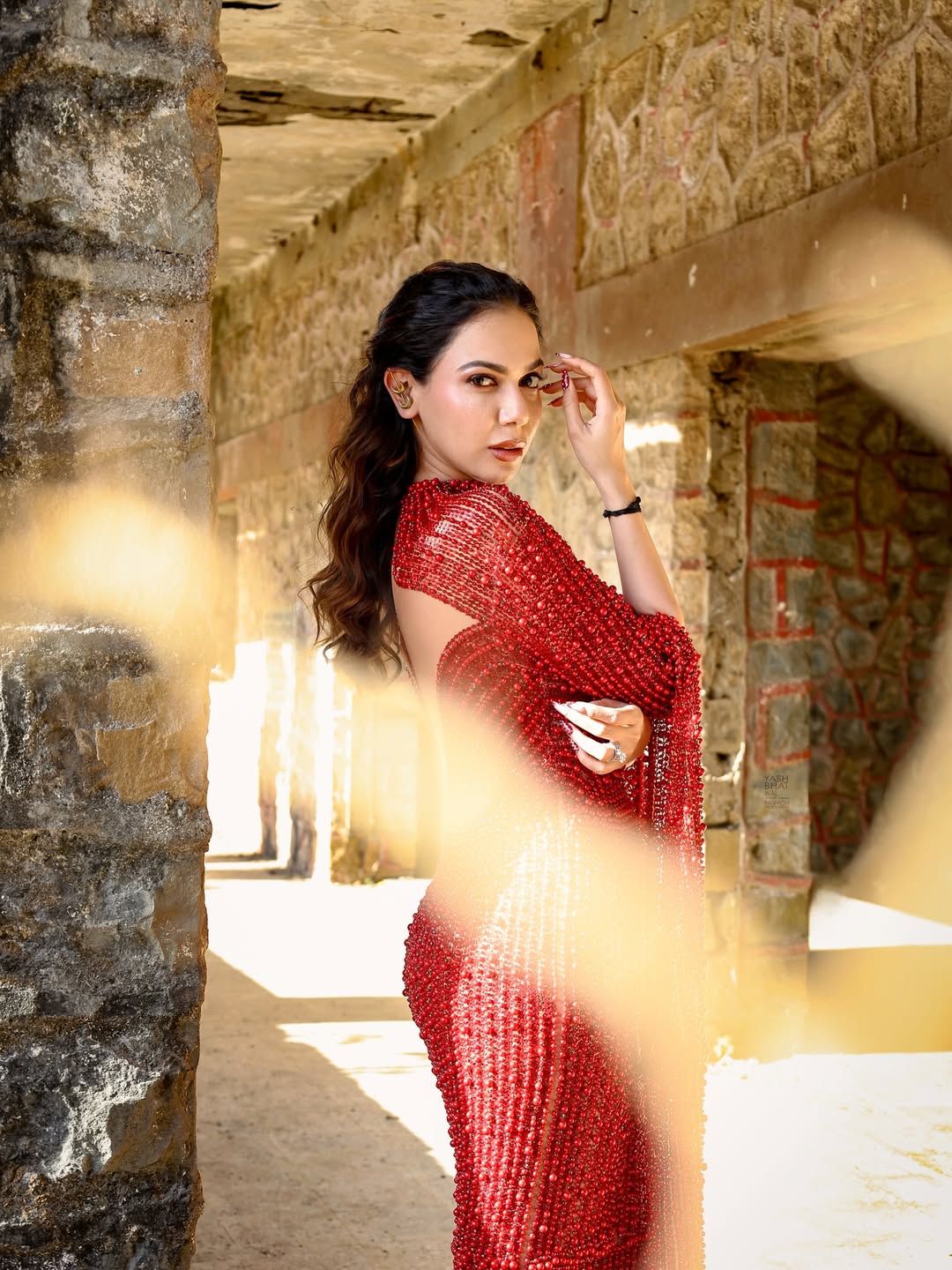 Palak Purswani in dazzling red ensemble with confident style