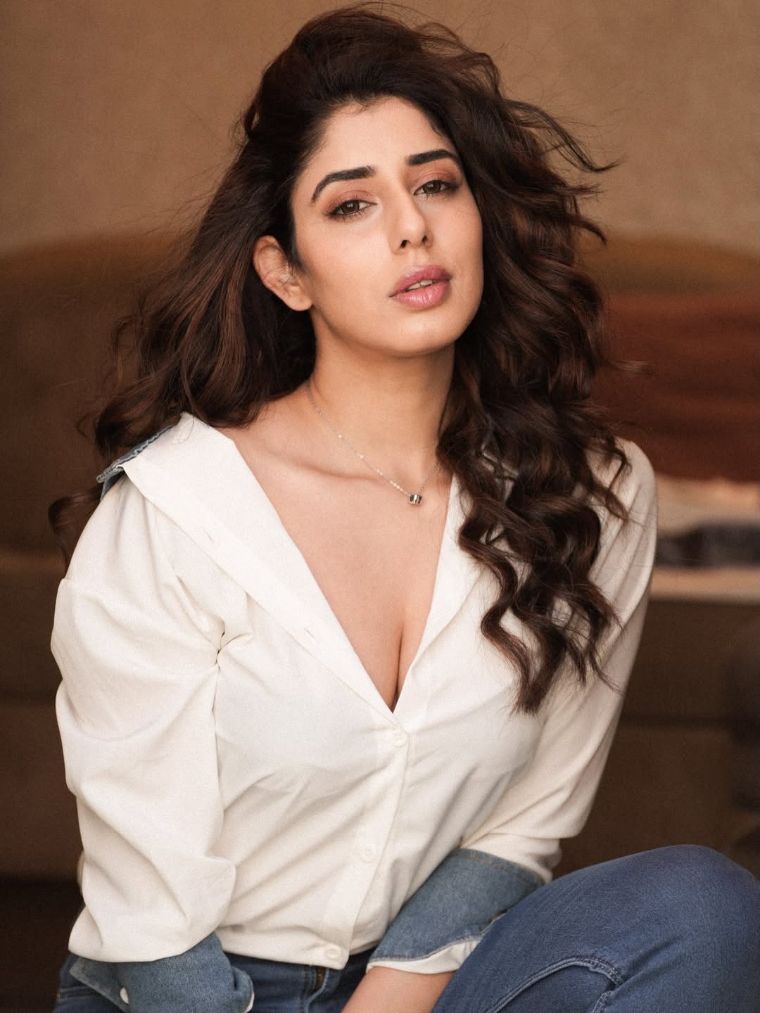 Jasmin Bajwa classic white shirt stylish casual pose