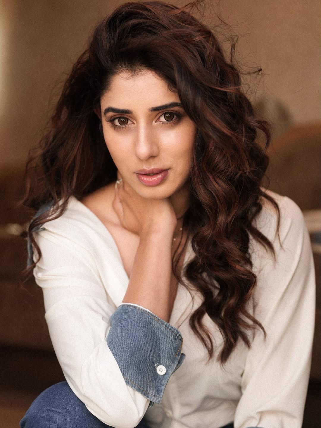 Jasmin Bajwa tousled hair white shirt chic vibe