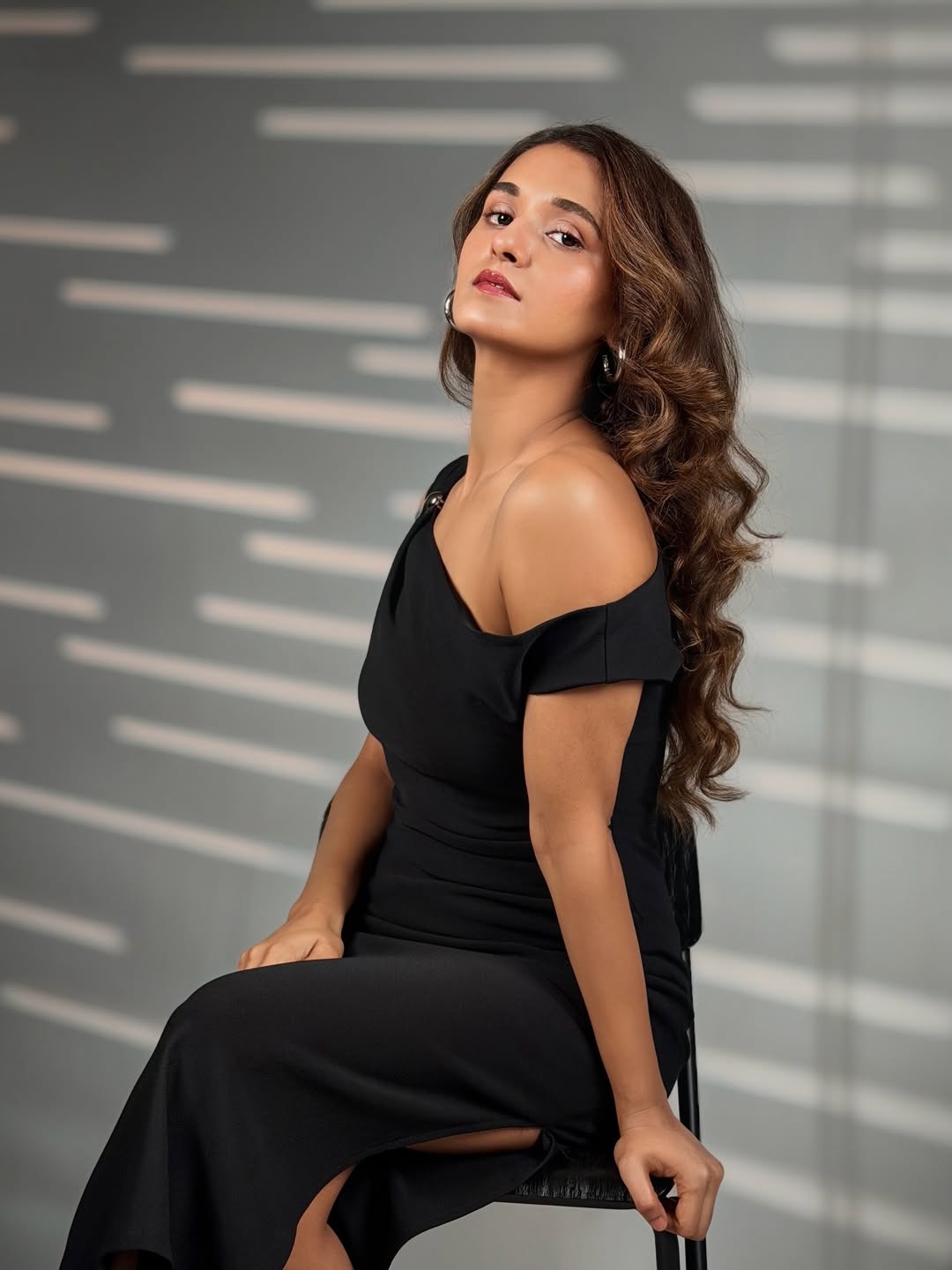 Shakti Mohan in elegant black dress stylish pose
