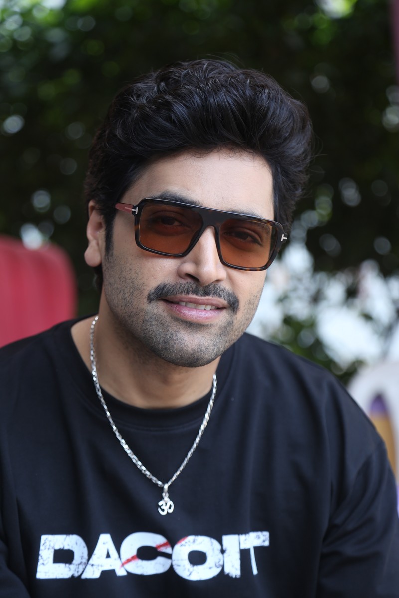 Adivi Sesh modern style Dacoit tee Om pendant