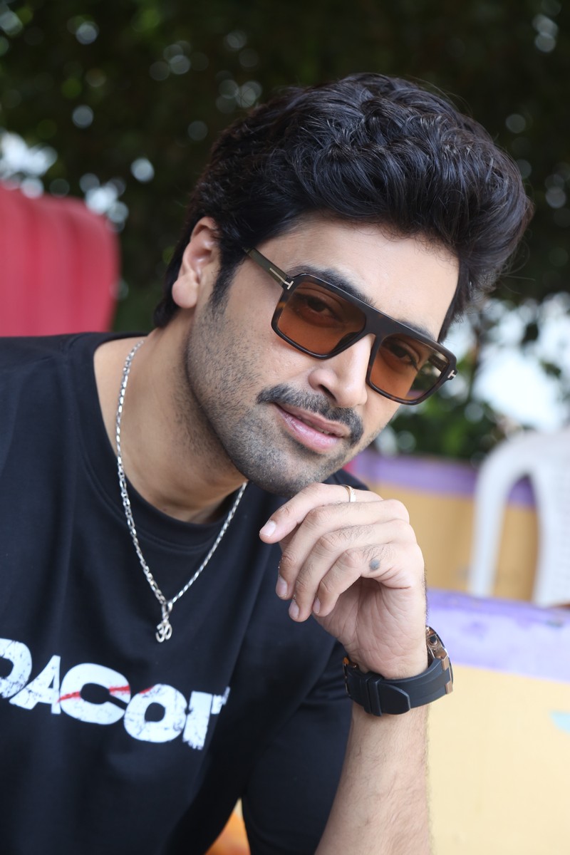 Adivi Sesh stylish look Tom Ford shades Om pendant