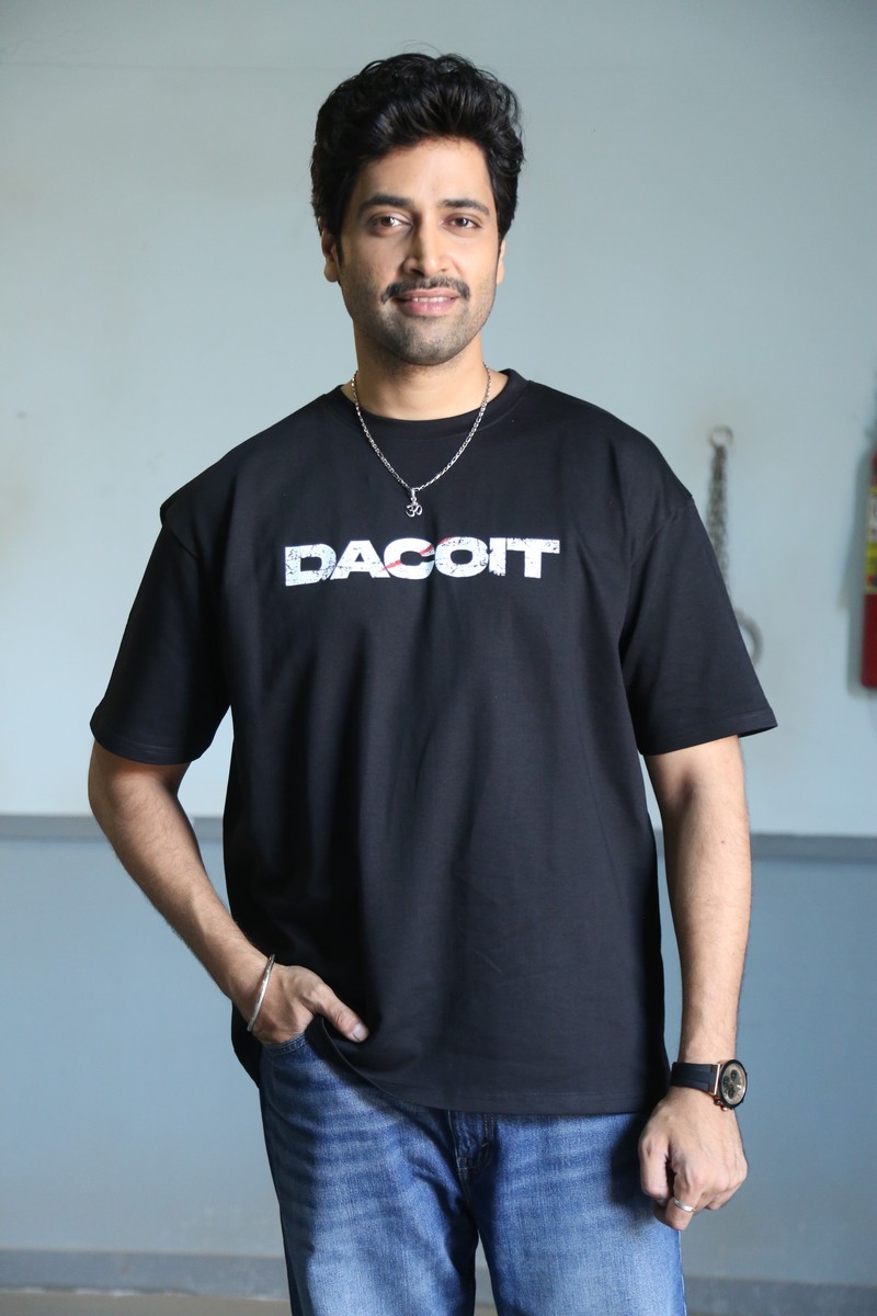 Adivi Sesh stylish Dacoit tee spiritual pendant look