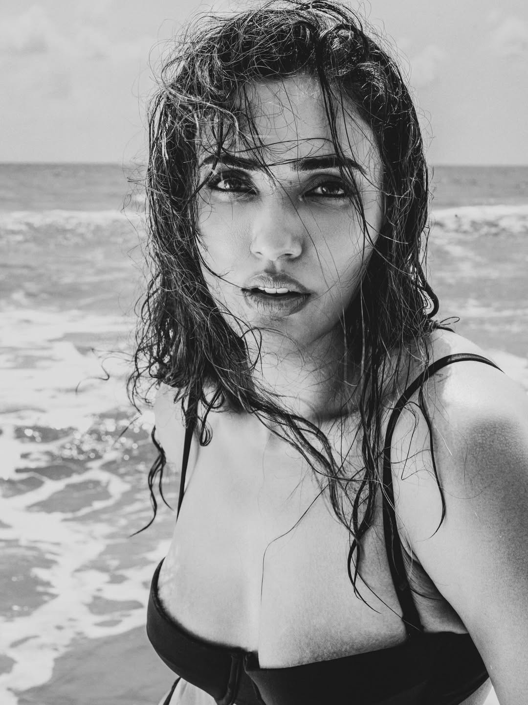 Akshara Gowda confident beach pose