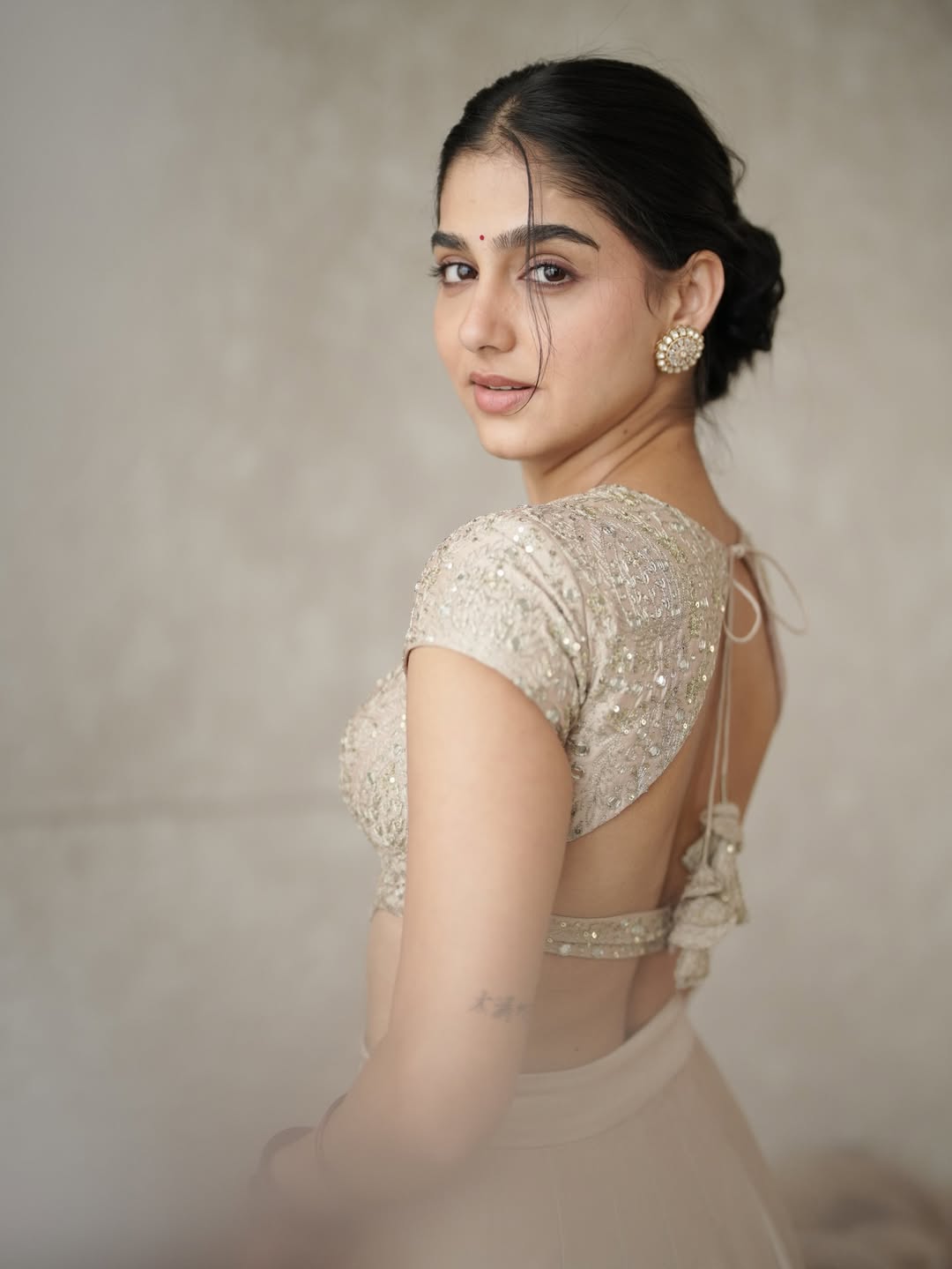 Anaswara Rajan elegant backless blouse traditional fusion look