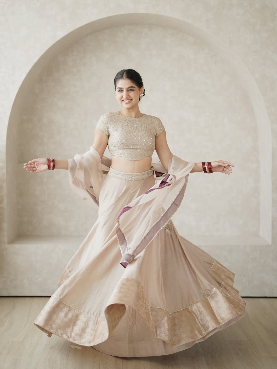 Anaswara Rajan twirling lehenga graceful cinematic pose