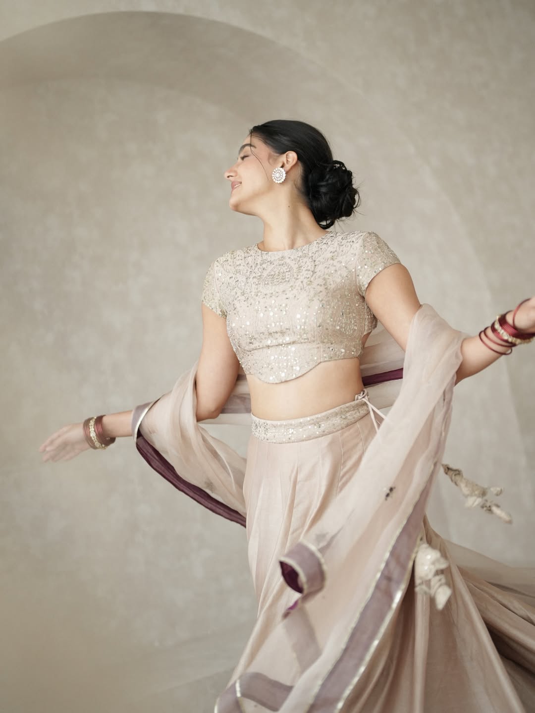 Anaswara Rajan graceful twirl elegant festive outfit