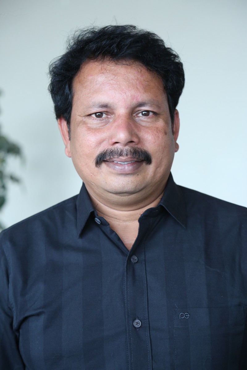 CH Satish Kumar sleek black shirt polished modern style