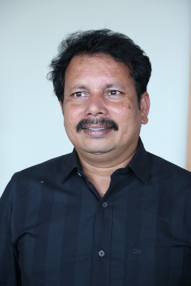 CH Satish Kumar black shirt composed stylish personality look