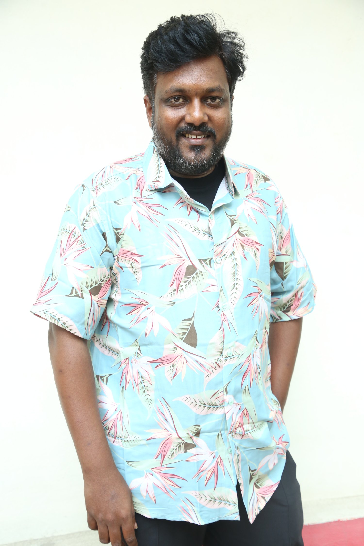 Chaitanya Moturi casual tropical style elegant appearance
