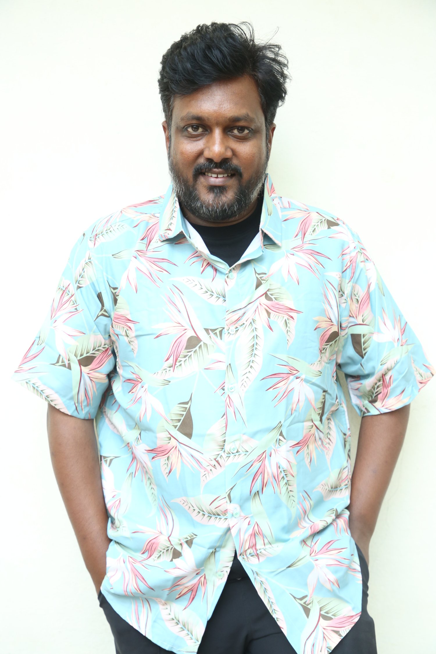 Chaitanya Moturi island style tropical shirt confident pose