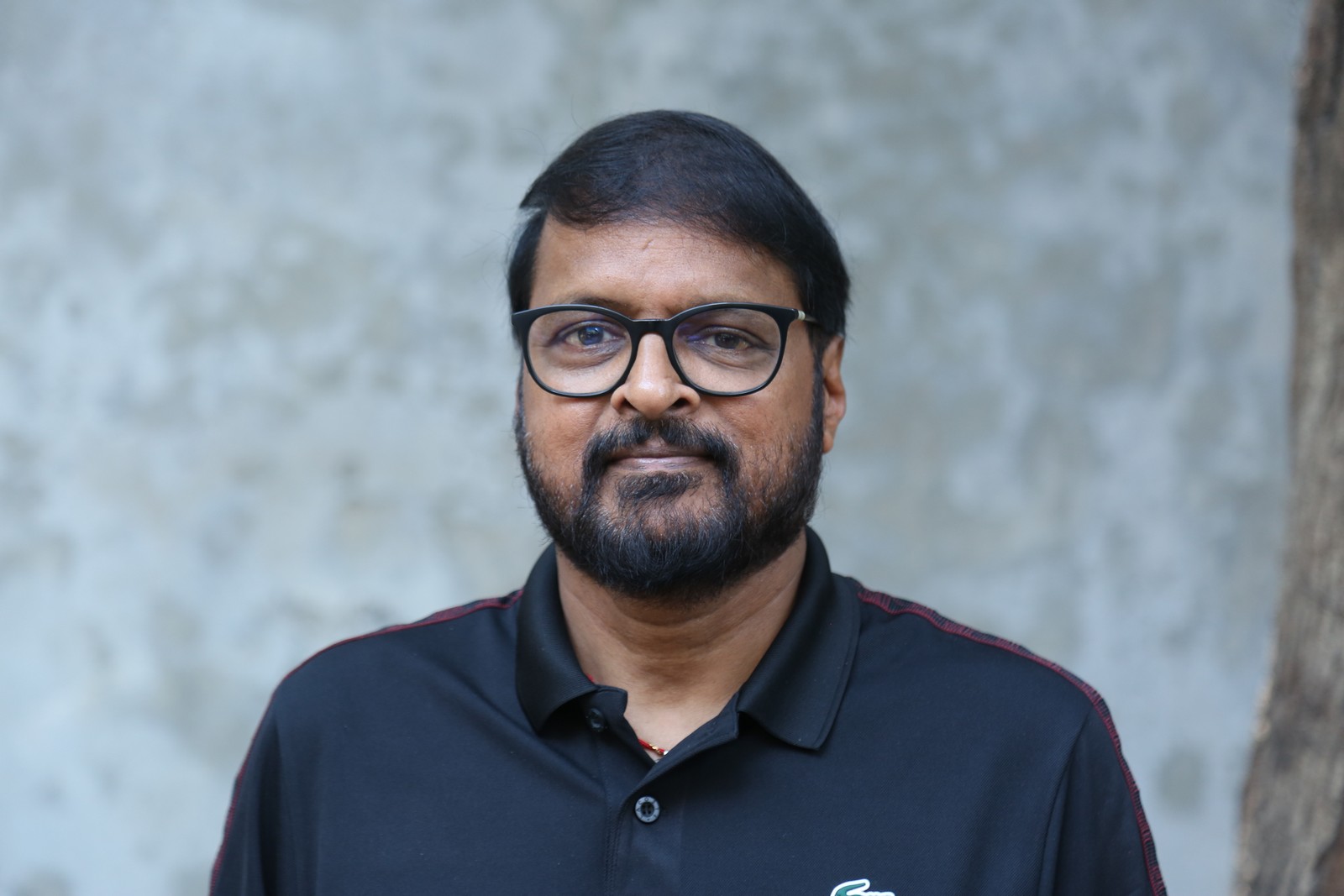 Chiranjeevi Pedamallu Cherry polo shirt stylish glasses look