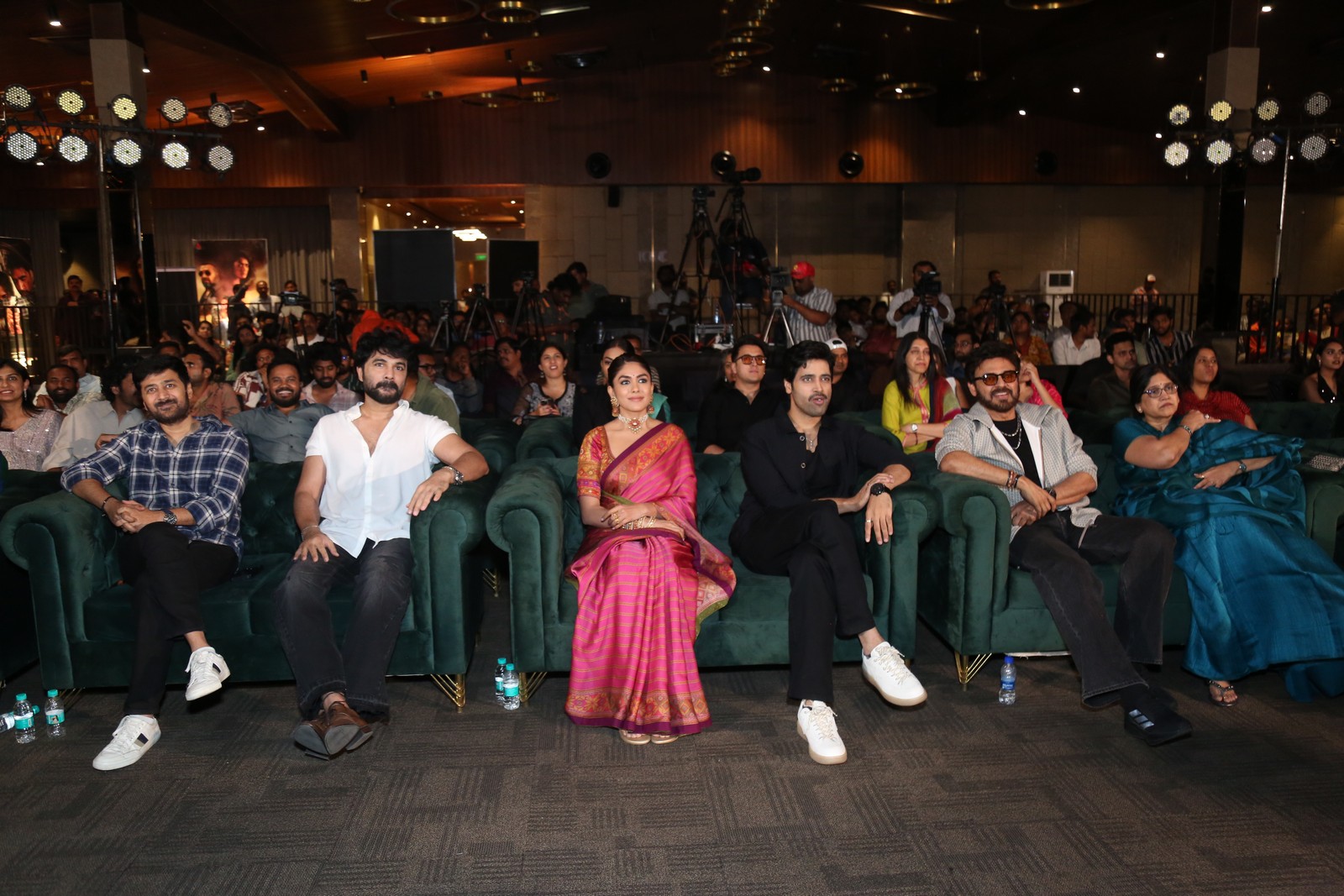 Director Rahul Ravindran and Dacoit team seated on stage