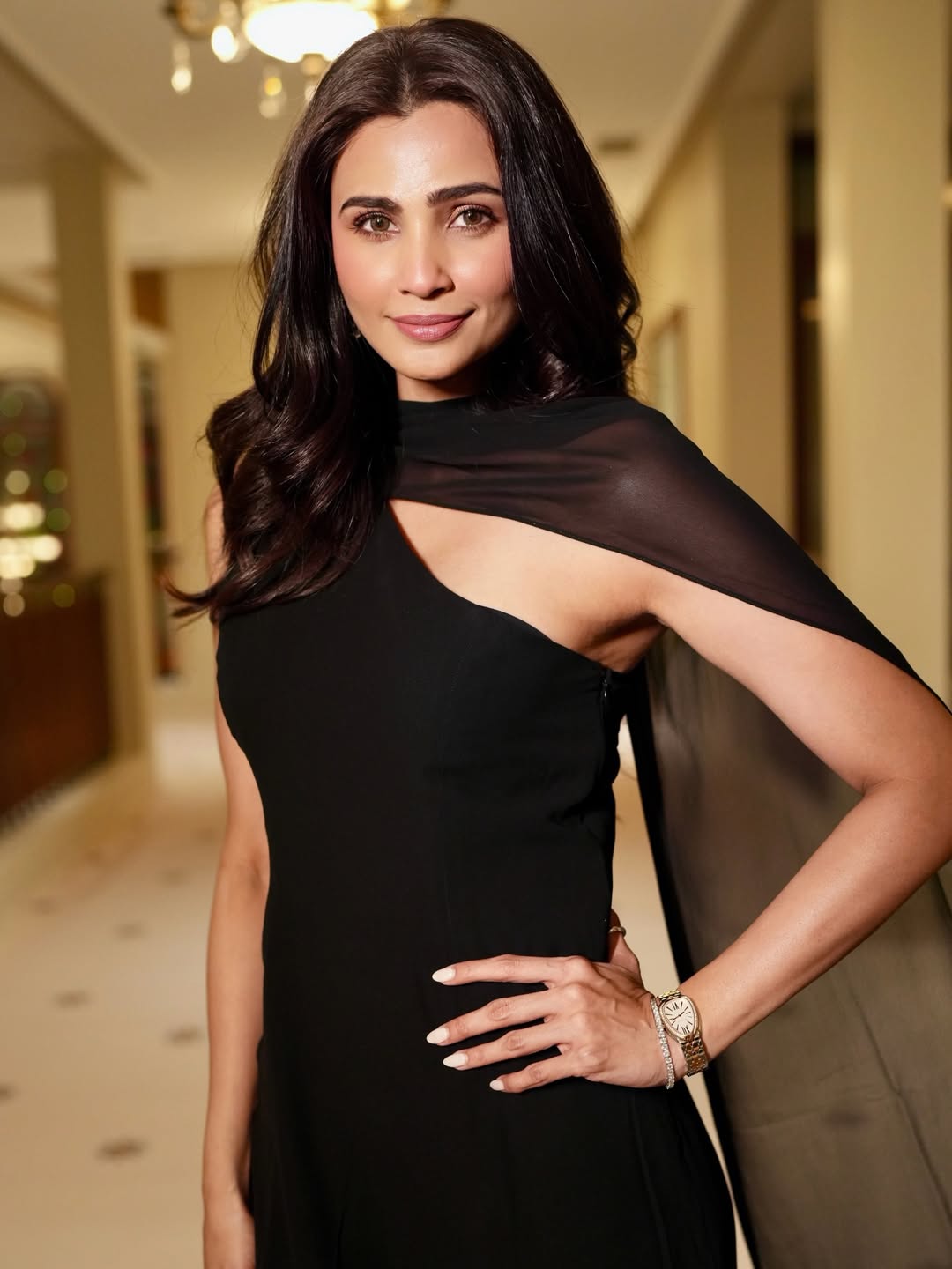 Daisy Shah little black dress stylish confident fashion pose