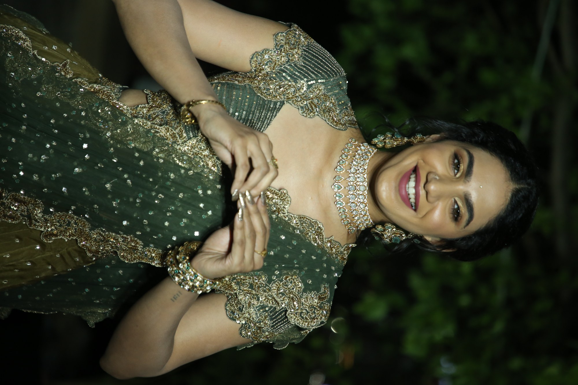 Deepa Thomas in sparkling outfit showcasing graceful traditional style