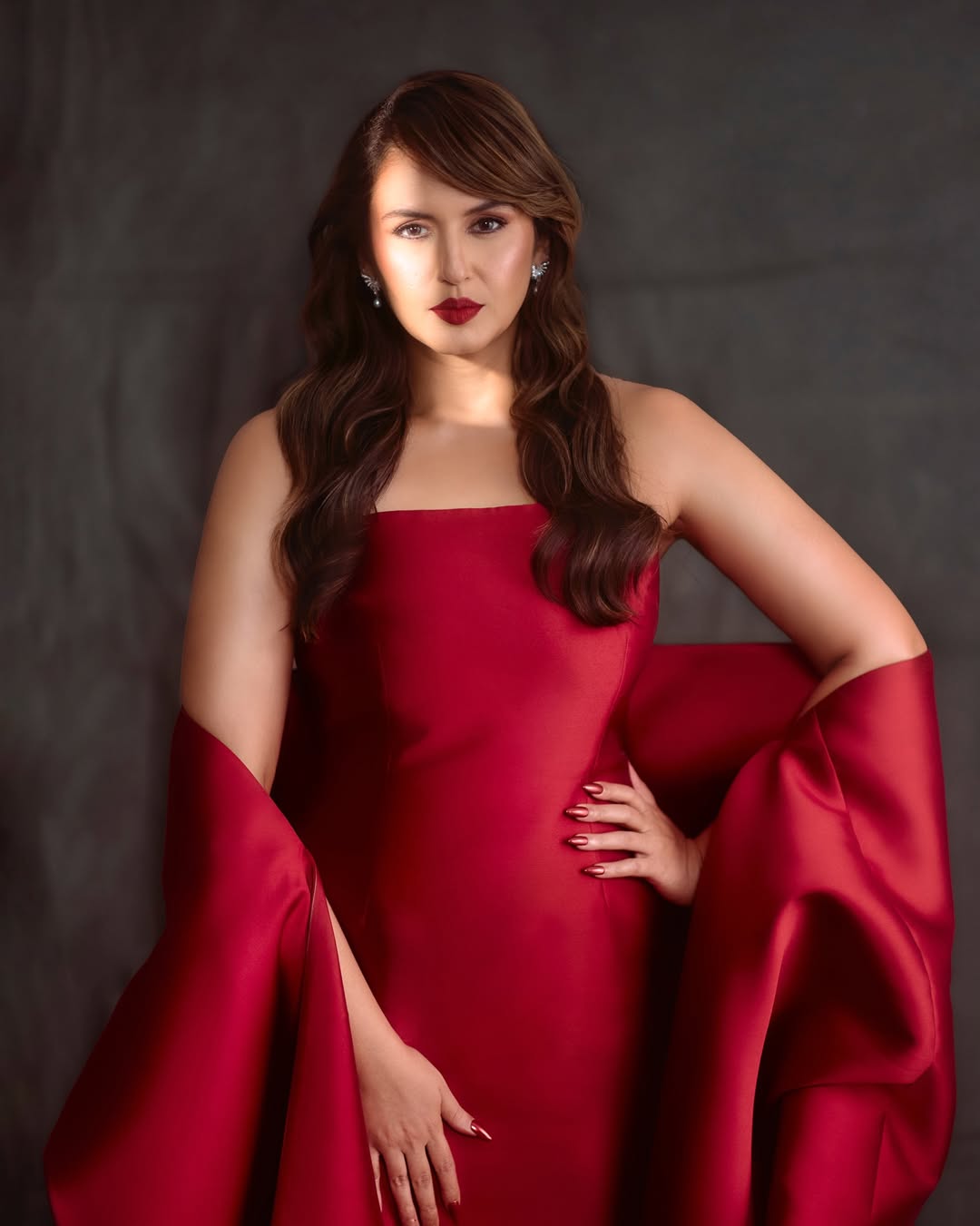 Huma Qureshi red gown dramatic sleeves glamorous look