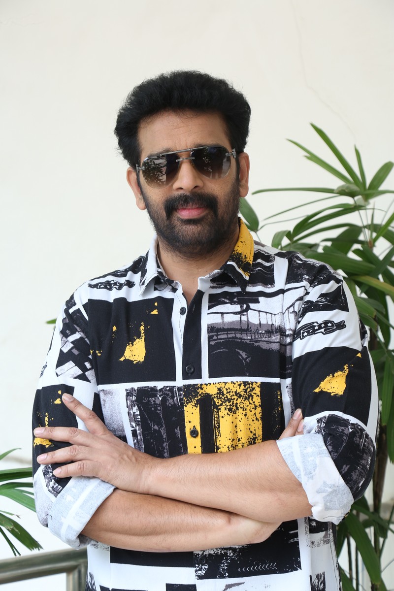 J D Chakravarthy black white yellow outfit bold style