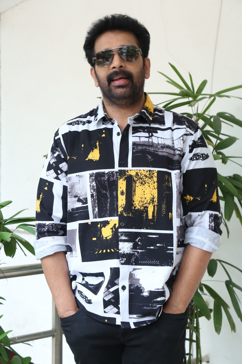 J D Chakravarthy printed shirt blurred face stylish look
