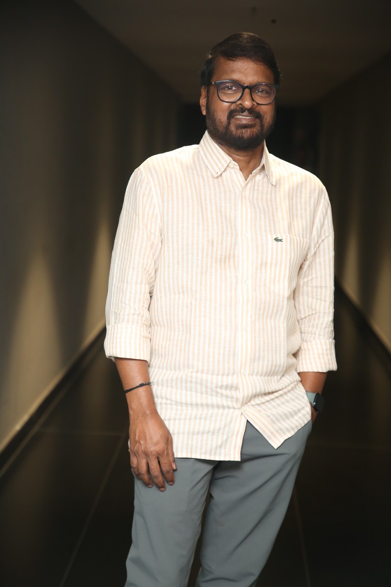 Producer Cherry posing at JETLEE trailer event