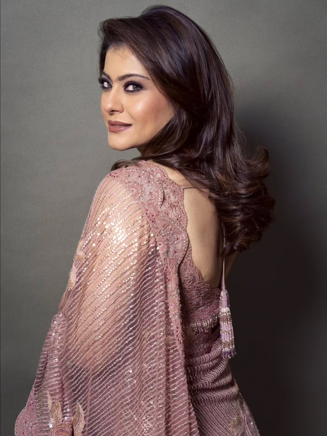 Kajol shimmering saree confident stylish pose