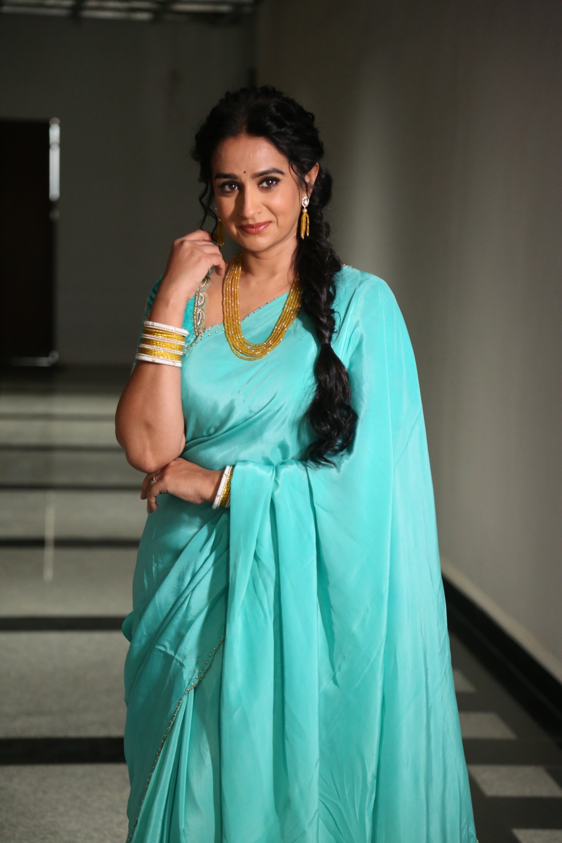 Laya turquoise saree glamorous traditional style